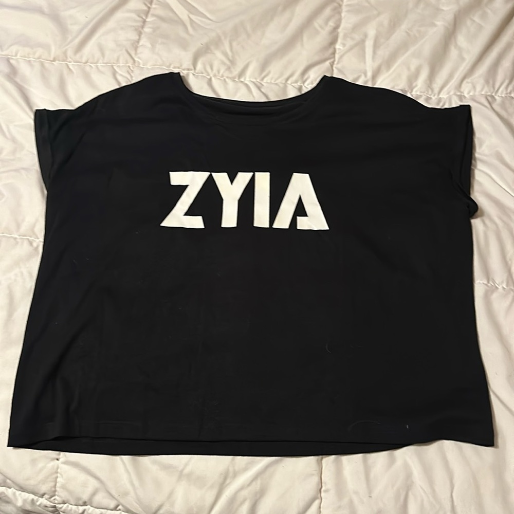 ZYIA black top Medium. Kind of cropish. Very cute. Never worn